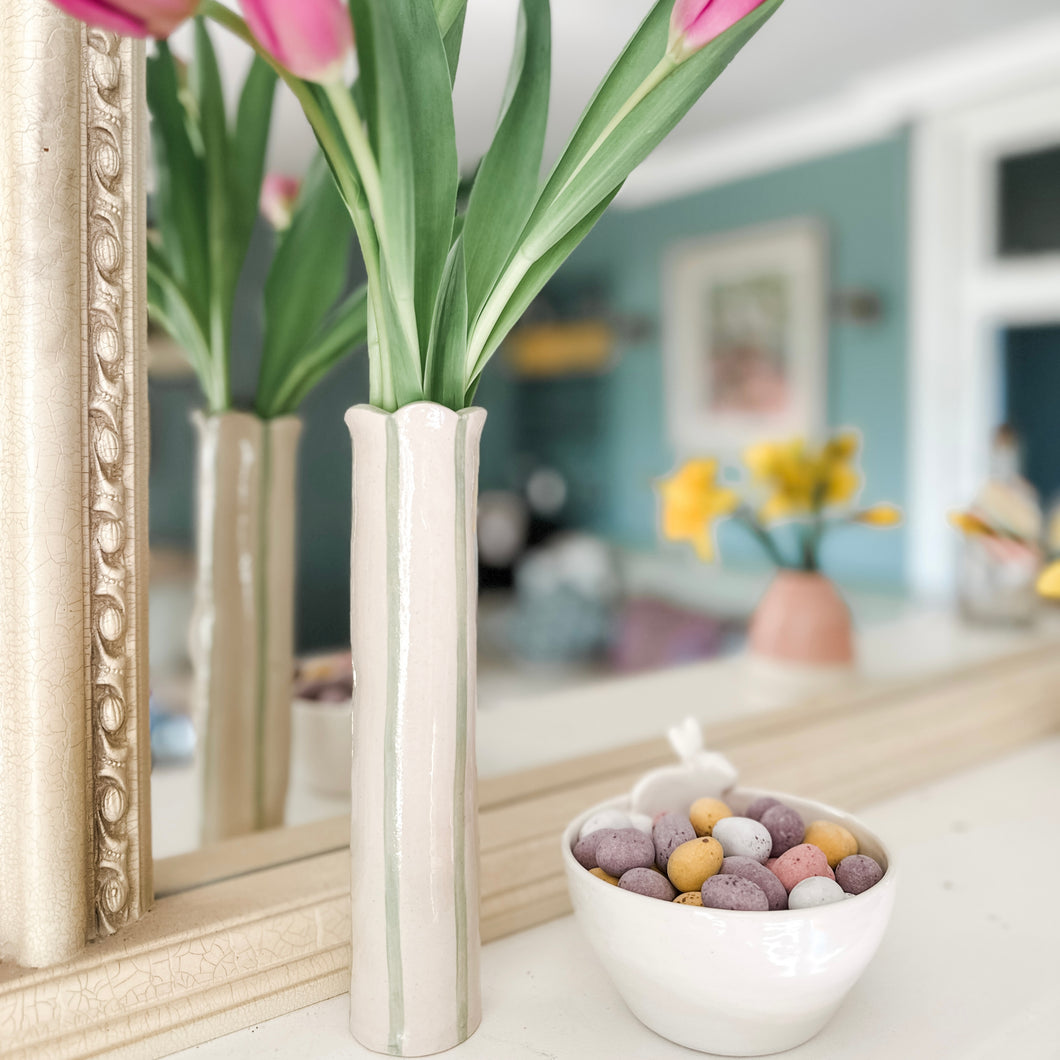 Handmade Sea Lavender Vase in Sage Green on a mantelpiece next to some Easter Eggs