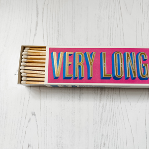 An open pack of Very Long Matches from The Archivist Gallery showing white tipped long matches
